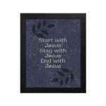 Christian wall art with purple-blue background, black leaf design, and white text Start With Jesus Stay With Jesus End With Jesus Bible Verse Wall Art black frame hung on the wall