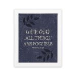 Purple-blue background with black leaf design, white text 'With God All Things Are Possible Matthew 19:26 Bible Verse Wall Art white frame hung on the wall.