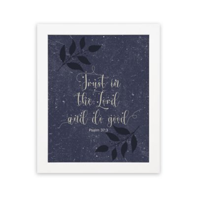 Purple-blue background with black leaf design, white text 'Trust In The Lord And Do Good Psalm 37:3 Bible Verse Wall Art white frame hung on the wall