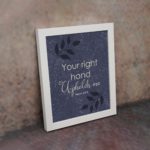 Infidu Your Right Hand Upholds Me Psalm 63:8 Bible Verse Wall Art with purple-blue background and black leaf design for home or office decor white frame on the wall art