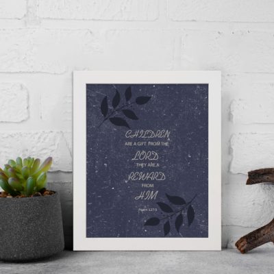 Purple Blue Color background with black color leaf design, white font, text: "Children Are A Gift From The Lord They Are A Reward From Him Psalm 127:3 Bible Verse Wall Art and white frame displayed on the wall.