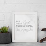 Gray background with leaf design, black and gray text 'For With God Nothing Shall Be Impossible Luke 1:37 Bible Verse Wall Art white frame displayed on the wall