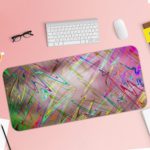 Infidu Artistic Desk Pad with an abstract marbled design in pastel colors pink, blue, green, and yellow with paint-like strokes and splatters. Desk Pad with Keyboard and Mouse