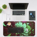 Dark burgundy desk pad with a large, abstract floral pattern in bright mint green, adding a unique and artistic touch to your workspace. Desk Mat with a laptop