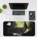 Desk mat with an abstract mountainous landscape painting in dark blue, light blue, and golden yellow, featuring a river or canyon. Desk Mat with an Apple Laptop