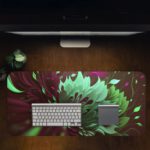 Dark burgundy desk pad with a large, abstract floral pattern in bright mint green, adding a unique and artistic touch to your workspace. Desk Pad Design Kept on a computer table