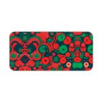 Desk pad with an abstract pattern of overlapping circles and swirls in red, green, and dark blue. Desk Pad kept on a plain white background