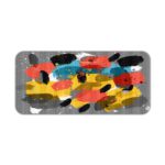 Infidu Artistic Patterns Desk Pad with bold, brushstroke-like shapes in yellow, black, red, and white on a gray background. Desk Pad kept on a plain white background