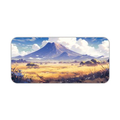 Desk pad with a serene mountain landscape, snowy peaks, blue sky, and desert terrain. Desk Pad kept on a plain white background