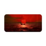 Infidu desk pad featuring a small boat on a red ocean under a red sky, capturing a serene sunrise or sunset scene. Desk Pad kept on a plain white background