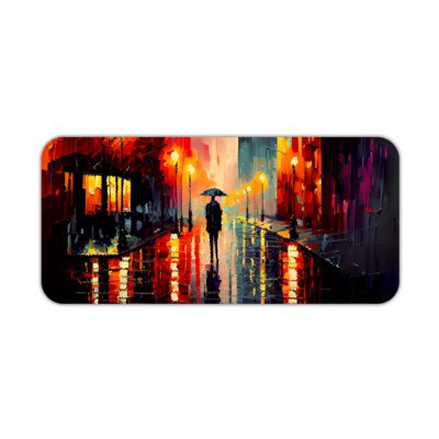 Desk pad featuring a vibrant nighttime city scene with bright colors reflecting off wet streets. Silhouette of a person with an umbrella in the center. Desk Pad kept on a plain white background