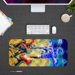 Infidu Artistic Desk Mat with dynamic swirling abstract pattern in yellow, red, and blue on a dark background. Desk Pad with Design Kept on a computer table