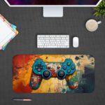 Gaming Desk Pad featuring a blue, red, and yellow controller with a sandal orange and yellow background, accented with vibrant paint splashes Desk Pad with Antique Video Game Design Desk Pad with Antique Video Game Design Kept gray background