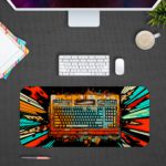 Infidu Tech Fusion with Keyboard Desk Pad featuring a vibrant, colorful background with a splash effect radiating from the keyboard. Desk Pad kept on a gray background