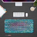 Infidu Artistic Patterns Desk Mat with a blue and teal wavy pattern that resembles water reflections. desk pad designed to be kept on a computer table