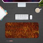 Infidu Artistic Patterns Desk Pad with deep red and orange background and textured abstract designs. desk pad Design Kept on a computer table