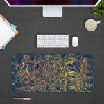 Infidu Artistic Patterns Desk Pad - Whispering Winds Abstract Art with colorful swirling lines on a black background Design Kept on a computer table