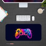 Gaming Desk Pad featuring a colorful controller in pink, blue, and yellow on a navy blue background, designed for a vibrant and unique gaming setup Desk Pad on the computer table