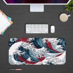 Infidu Artistic Desk Mat with Japanese Ocean vector art in blue and red waves on a white background. Design Kept on a computer table