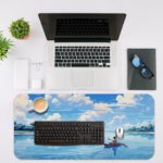 Man rowing a boat on calm water with a bright blue sky and fluffy white clouds reflecting below. Desk Mat with an Apple Laptop