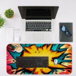 Infidu Color Wave Boom Animated Desk Pad with a bright sun, bold colors, and a dramatic comic-style design. Desk Mat with a laptop