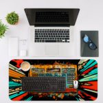 Infidu Tech Fusion with Keyboard Desk Pad featuring a vibrant, colorful background with a splash effect radiating from the keyboard. Desk Mat with an Apple Computer