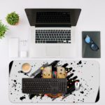 Infidu Artistic Splatter Desk Pad with a white background, black splatters, and a colorful computer mouse in the center. Desk Mat with an Apple Computer