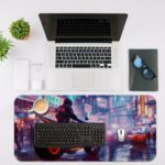 Desk pad featuring a stylish biker on a red-wheeled motorcycle with a blurry blue and purple urban background. Desk Mat with an Apple Laptop