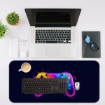 Gaming Desk Pad featuring a colorful controller in pink, blue, and yellow on a navy blue background, designed for a vibrant and unique gaming setup Design of Antique Video Game on a desk pad