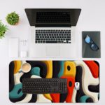 Infidu Artistic Patterns Desk Pad with abstract shapes in red, yellow, white, and teal for a modern artistic look. Desk Mat with in laptop