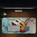 Infidu Tech Fusion with Mouse Desk Pad featuring a white mouse with orange and black details, splattered blue, white, and red background. Desk Pad on computer table