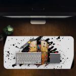 Infidu Artistic Splatter Desk Pad with a white background, black splatters, and a colorful computer mouse in the center. Desk Pad in computer table