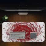 Infidu Artistic Desk Pad with a swirling vortex pattern in red, white, and black. Desk Pad in computer table