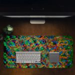 Infidu Artistic Patterns Desk Pad with a multi-colored abstract design featuring zigzagging lines and pixelated shapes. Desk Pad in computer table