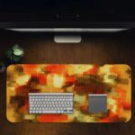 Infidu Artistic Desk Pad - Warm-toned abstract design with pixelated squares Design Kept on a computer table