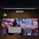 Desk pad featuring a stylish biker on a red-wheeled motorcycle with a blurry blue and purple urban background. Desk Pad in computer table