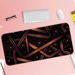 Infidu desk pad with a dark background, copper-colored ribbons, and glowing pinkish-purple lights, creating a sleek, modern look. Desk Pad with Keyboard and Mouse