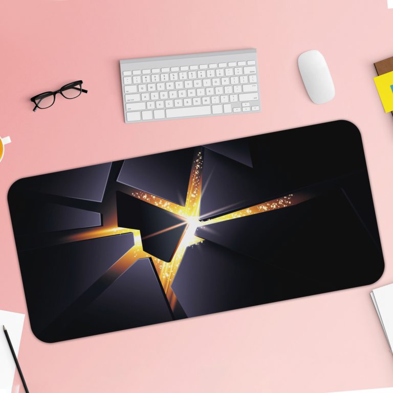 Desk pad with a dark background and sharp golden shapes resembling shattered glass, with a bright center point. Desk Pad with Keyboard and Mouse