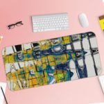 Infidu Artistic Desk Mat with abstract cityscape design in yellow and blue with white lines. Desk Pad with Keyboard and Mouse