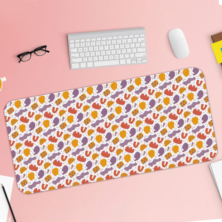 Desk pad with orange and yellow spots on a white background, featuring a playful and lively design. Desk Pad with Keyboard and Mouse