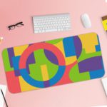 Infidu Artistic Patterns Desk Pad with colorful geometric shapes in pink, green, yellow, blue, and purple. Desk Pad with Keyboard and Mouse