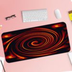 Infidu Artistic Patterns Desk Pad features a swirling red spiral on a deep black background, creating a dramatic vortex effect. Desk Pad with Keyboard and Mouse