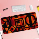 Infidu Artistic Patterns Desk Pad with bold red, orange, and black geometric shapes for a modern and striking look. Desk Pad with Keyboard and Mouse