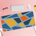 Infidu Artistic Pattern Desk Pad - Blue background with abstract shapes in orange, yellow, and light blue Desk Pad with Keyboard and Mouse