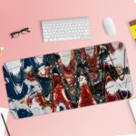 Infidu Artistic Desk Pad with abstract brushstroke pattern in red, blue, and black on a white background. Desk Pad with Keyboard and Mouse