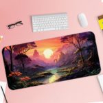 Desk pad with a tranquil lake, colorful sky, and silhouetted trees, featuring vibrant shades of orange, purple, and blue. Desk Pad with Keyboard and Mouse