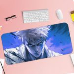 Desk pad featuring a manga-style anime character with white hair and a serious expression on a vibrant blue background. Desk Pad with Keyboard and Mouse