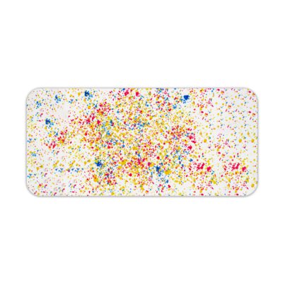 Infidu Artistic Desk Mat with speckled colorful dots in blue, red, yellow, and green on a white background. Desk Pad kept on a plain white background