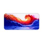 Bright orange and red curling wave against a deep blue background. Desk Pad kept on a plain white background