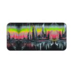 Abstract glitch art of a stylized cityscape with tall buildings silhouetted against a colorful, dreamy sky. Desk Pad kept on a plain white background